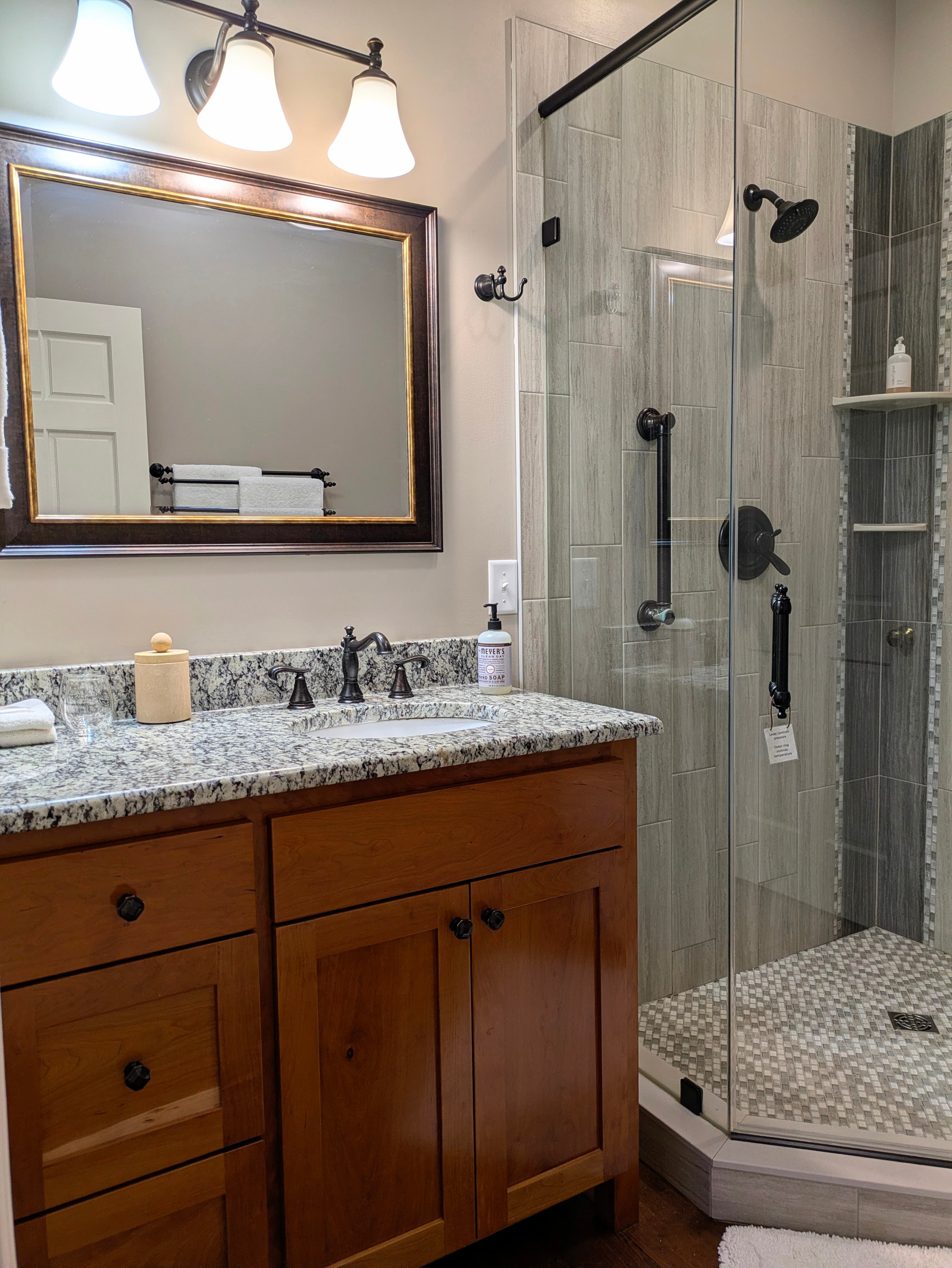 New bathroom with granite countertop